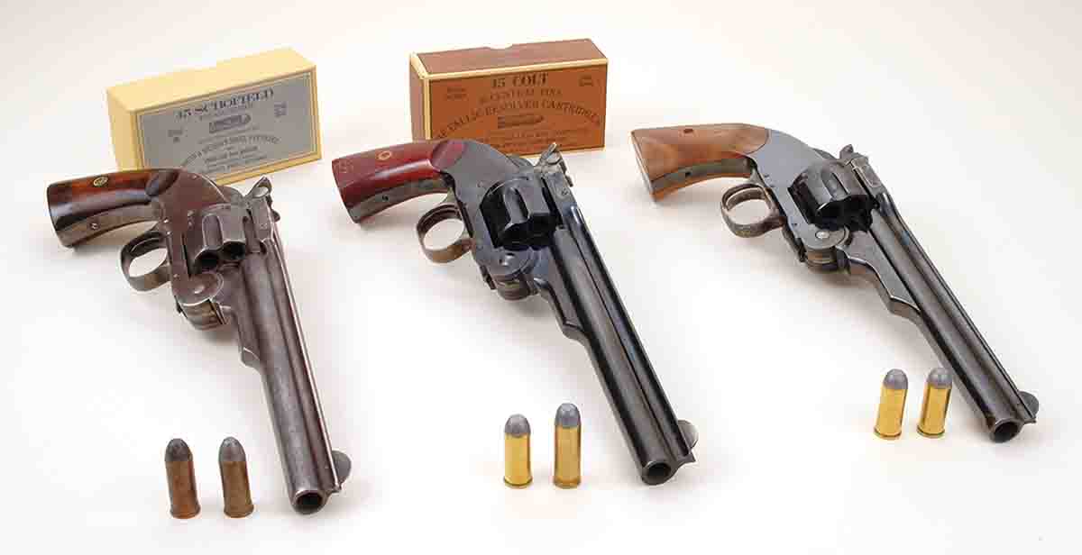 These revolvers include (from left): a S&W Model No. 3 “Schofield” .45 made in 1876, a Uberti No. 3 “Schofield” made in the 1990s and a S&W Model No. 3 “Schofield” .45 made in 2000.